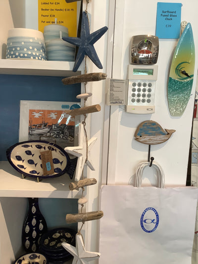 String of starfish and driftwood