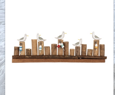 Seagulls on Groynes with Buoys