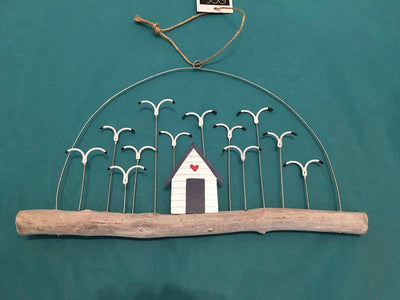 Flock of Gulls with Beach Hut